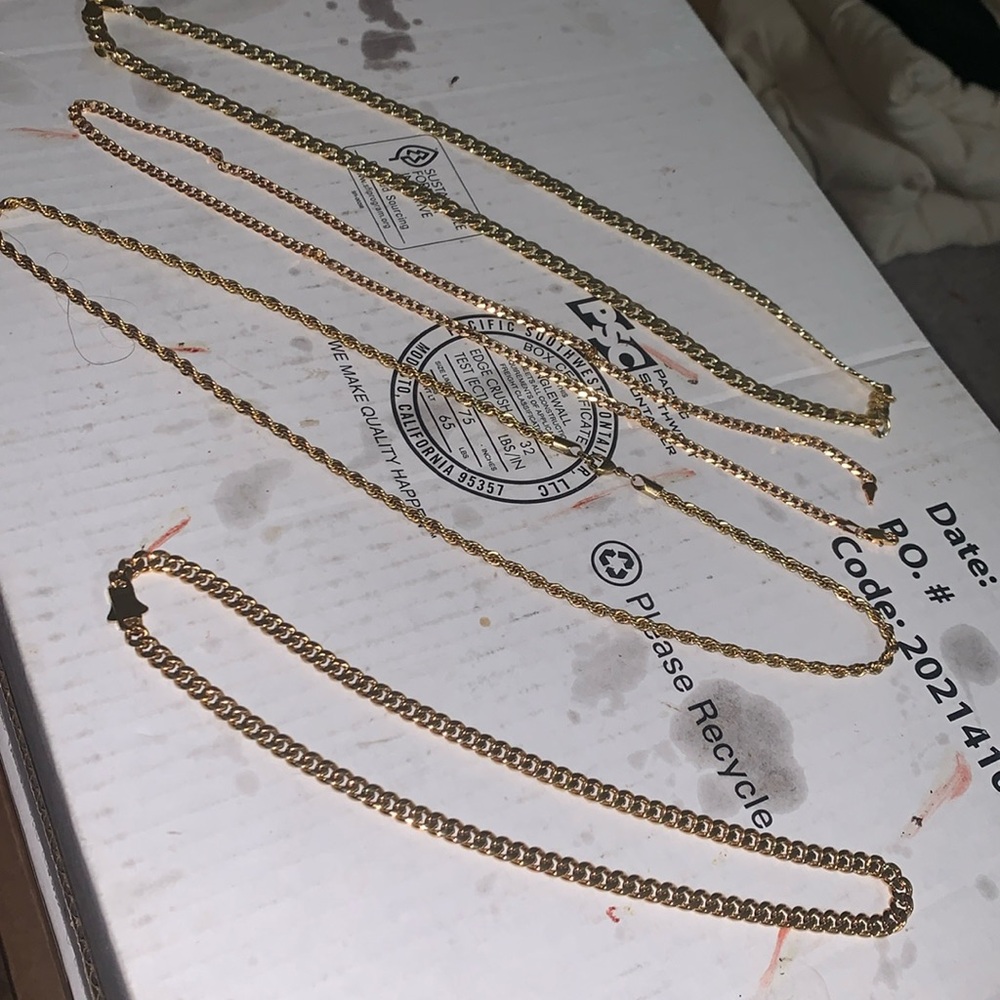 4 gold necklaces brand new I forgot the sizes